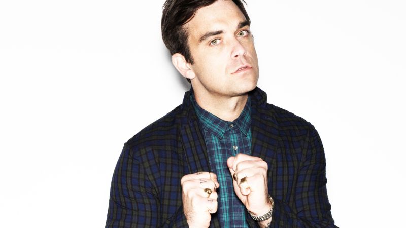 Archivo:Robbie Williams background.jpg